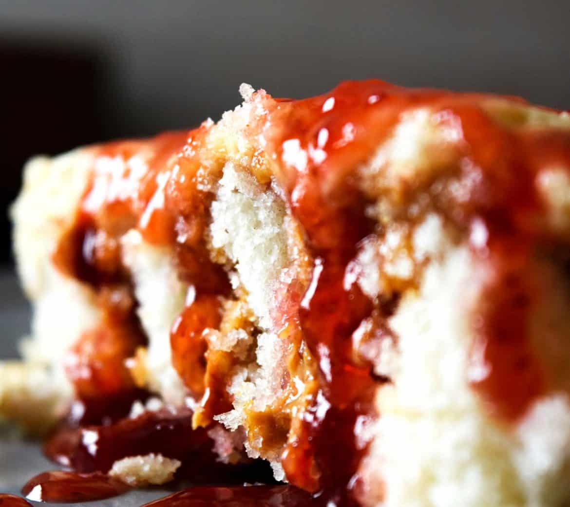 Peanut Butter Strawberry Jelly Poke Cake